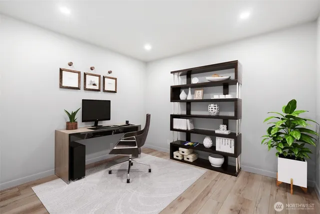 a workspace with furniture and wooden floor