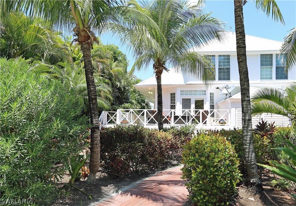 508 Useppa Island Bokeelia, FL 33922 - Photo 1 of 22 a front view of a house with balcony