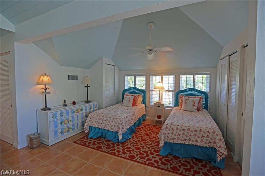 508 Useppa Island Bokeelia, FL 33922 - Photo 16 of 22 a bed room with a bed and window