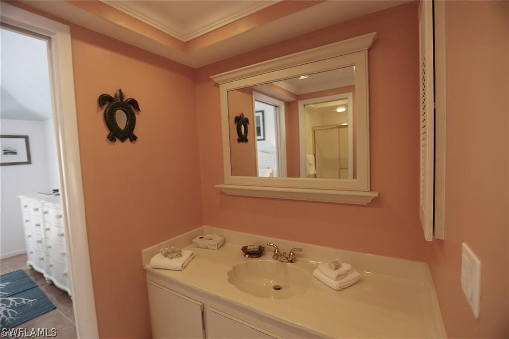 508 Useppa Island Bokeelia, FL 33922 - Photo 18 of 22 a bathroom with a sink and mirror
