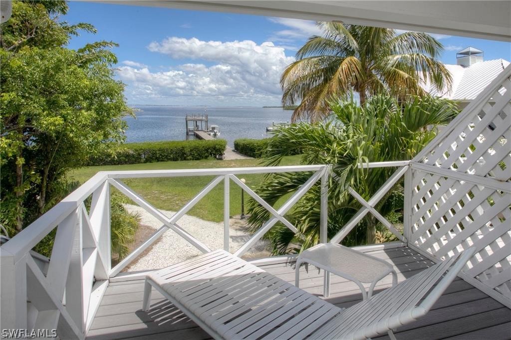 508 Useppa Island Bokeelia, FL 33922 - Photo 21 of 22 a view of outdoor space with swimming pool and furniture