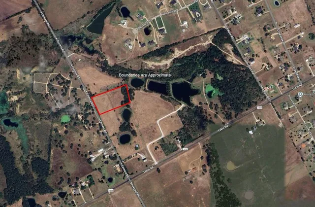 a bird view of house with outdoor space