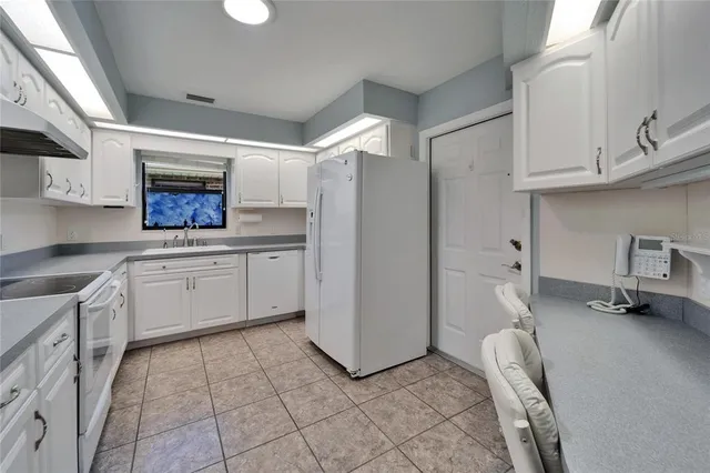 a view of front door of house with yard