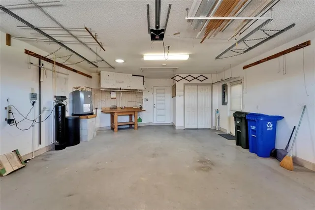 an aerial view of a city with ocean view