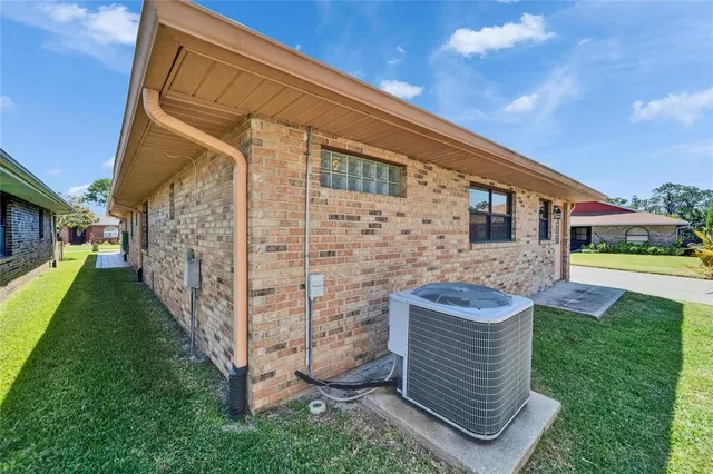 an aerial view of a house with a garden