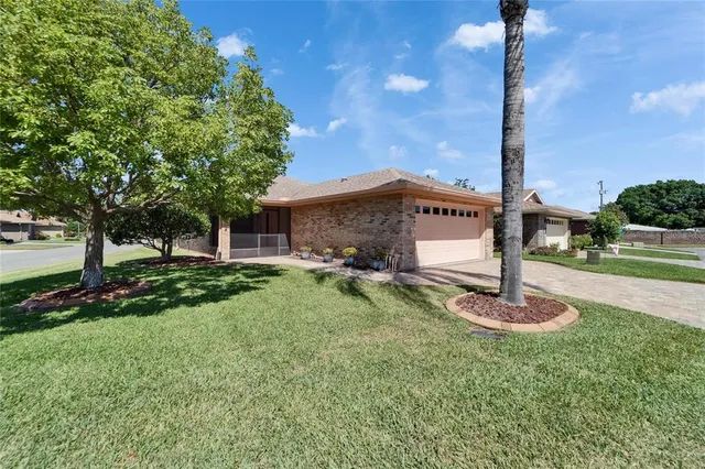 a view of an empty room with a fan