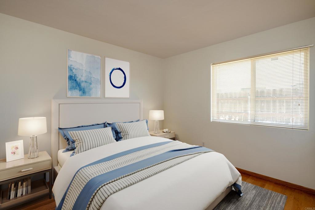 2236 Casa Cielo Spring Valley, CA 91977 - Photo 15 of 20 a bedroom with a bed and a lamp