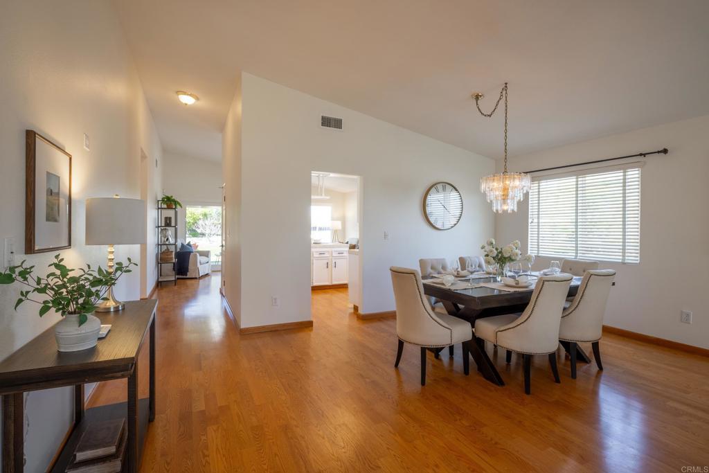 2236 Casa Cielo Spring Valley, CA 91977 - Photo 4 of 20 a view of a dining room with furniture window and wooden floor