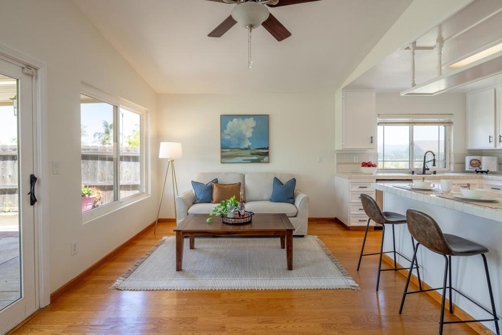 2236 Casa Cielo Spring Valley, CA 91977 - Photo 7 of 20 a living room with furniture and a wooden floor