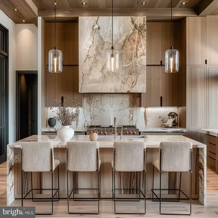 a kitchen with a dining table chairs and white cabinets