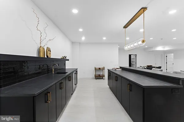 a kitchen with lots of counter space and a sink
