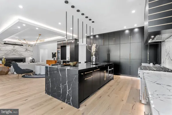 a kitchen with kitchen island granite countertop lots of counter top space