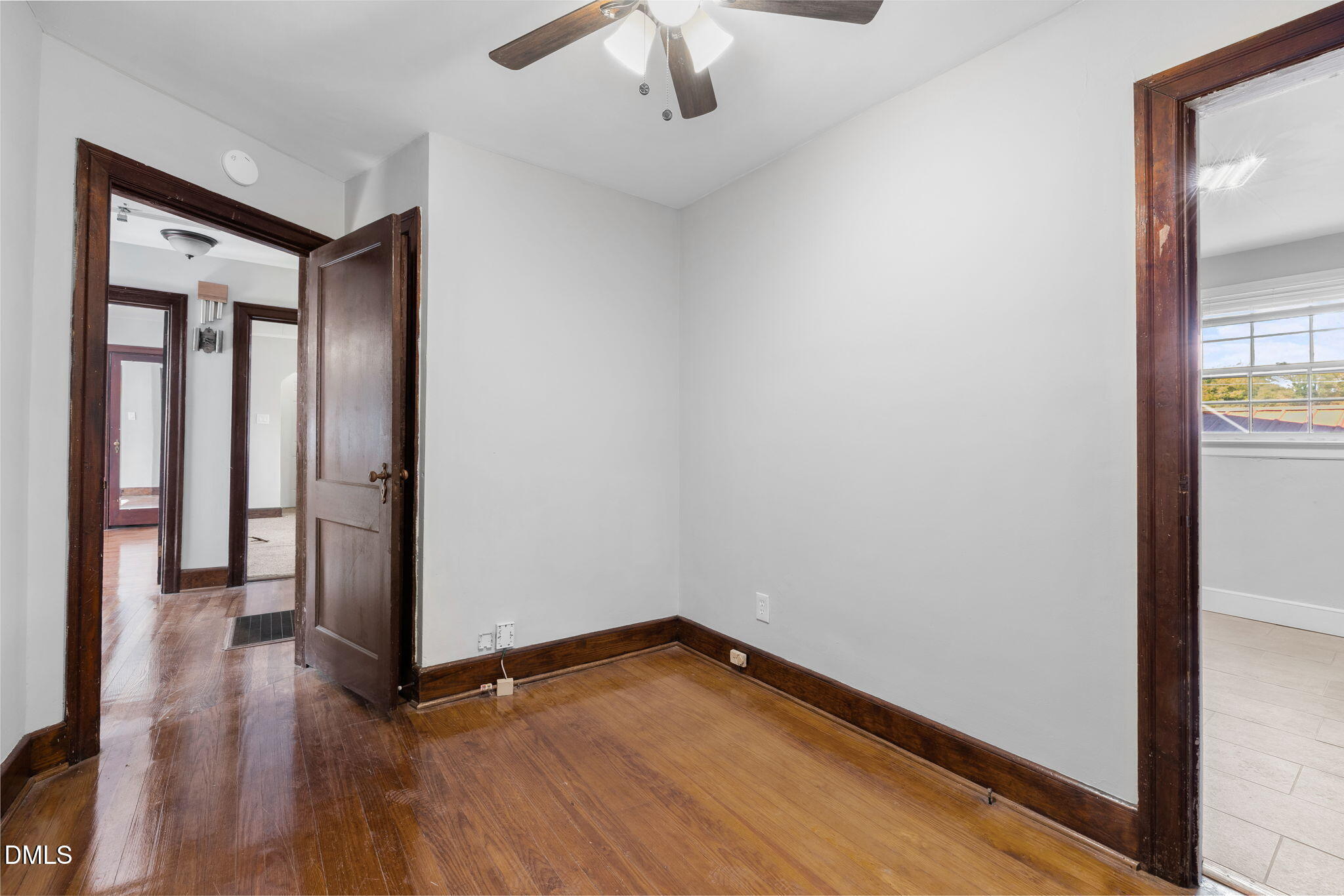 109 Lincoln Court Raleigh, NC 27610 - Photo 16 of 27 wooden floor in an empty room with a window