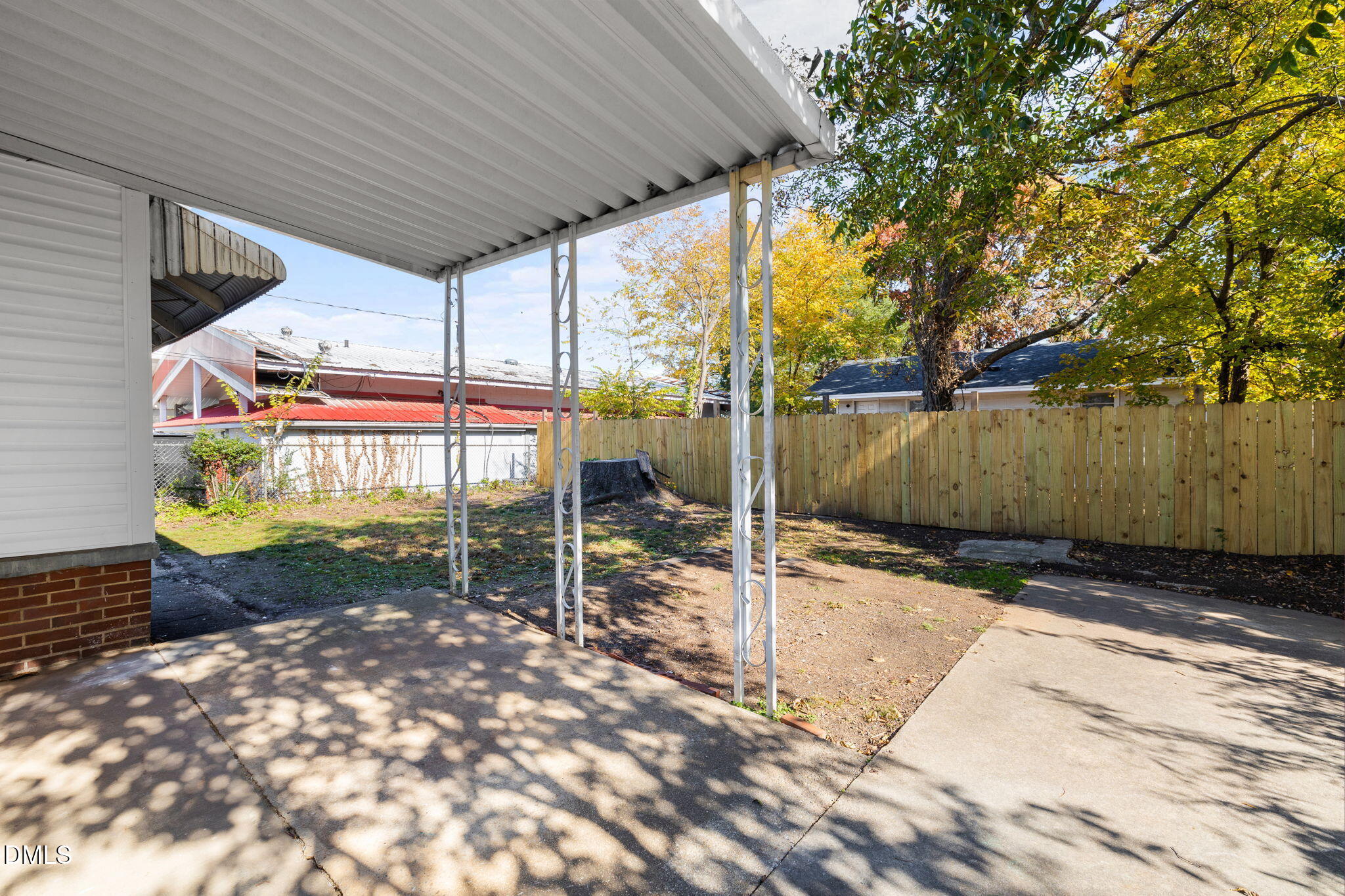 109 Lincoln Court Raleigh, NC 27610 - Photo 25 of 27 a backyard of a house with table and chairs