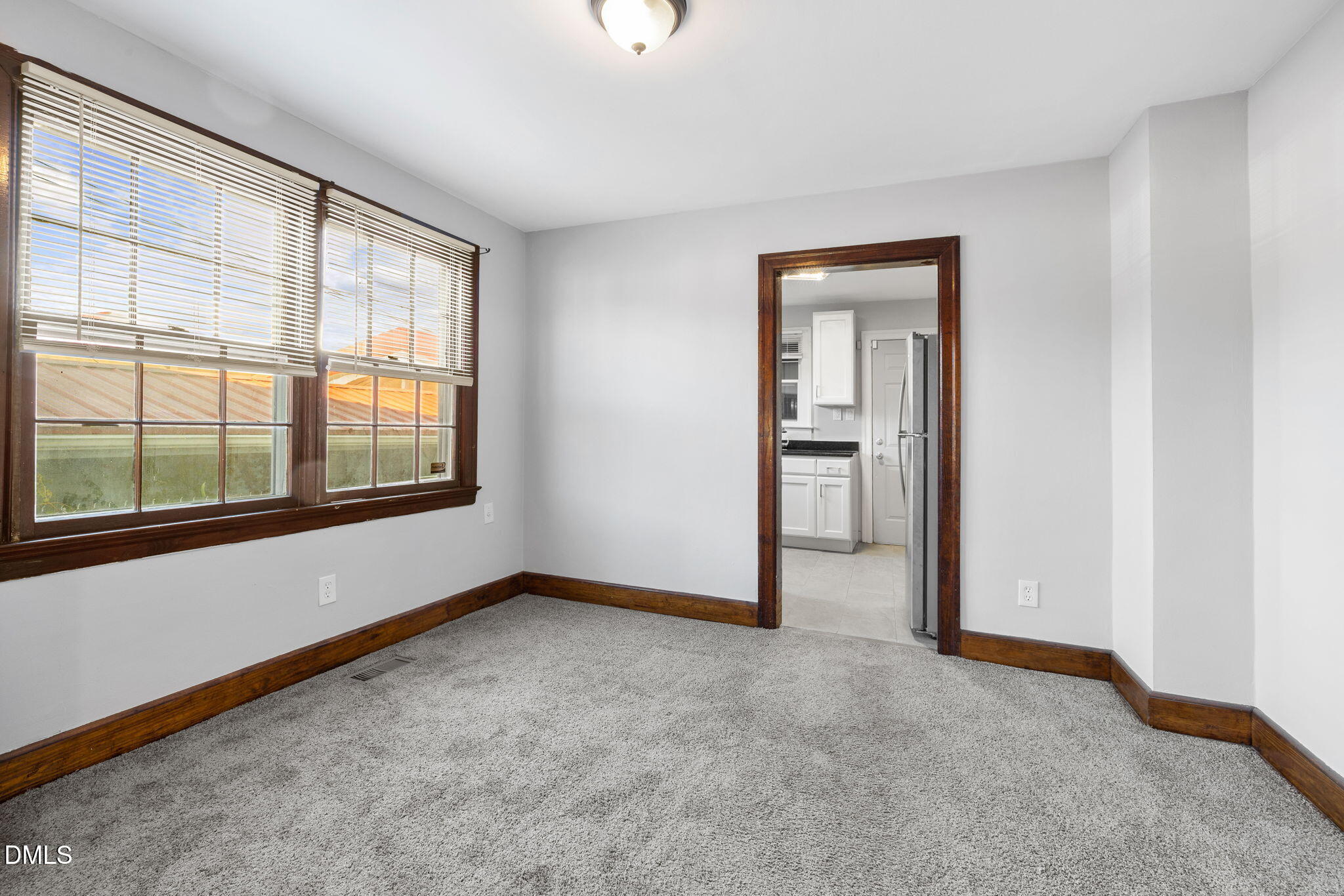 109 Lincoln Court Raleigh, NC 27610 - Photo 9 of 27 a view of an empty room with a window