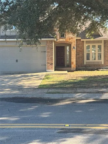 a view of a house with a swimming pool
