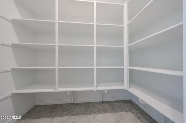 a view of room with empty shelves