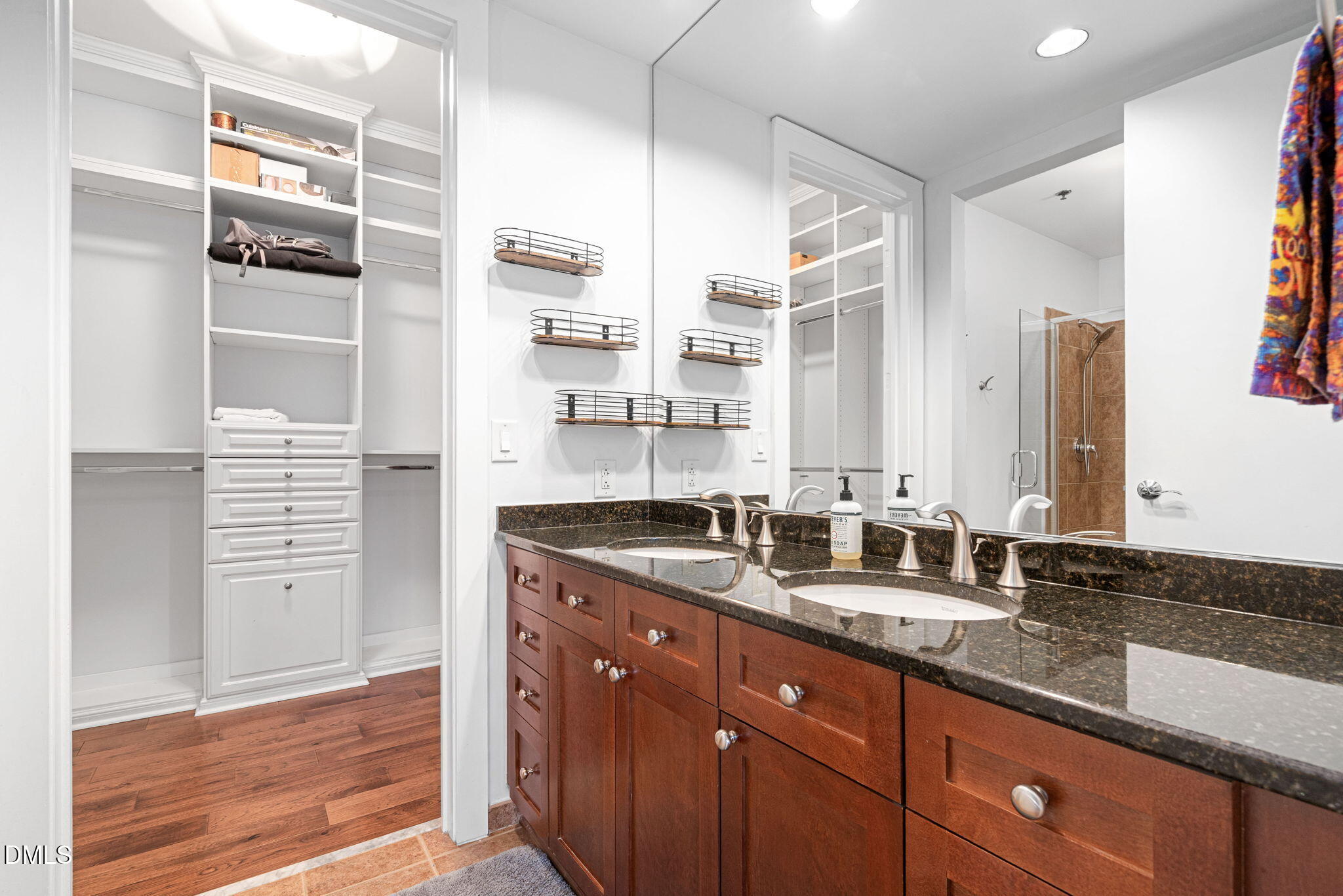 618 North Boylan Avenue, Unit 812 Raleigh, NC 27603 - Photo 22 of 35 a bathroom with a granite countertop sink and a mirror