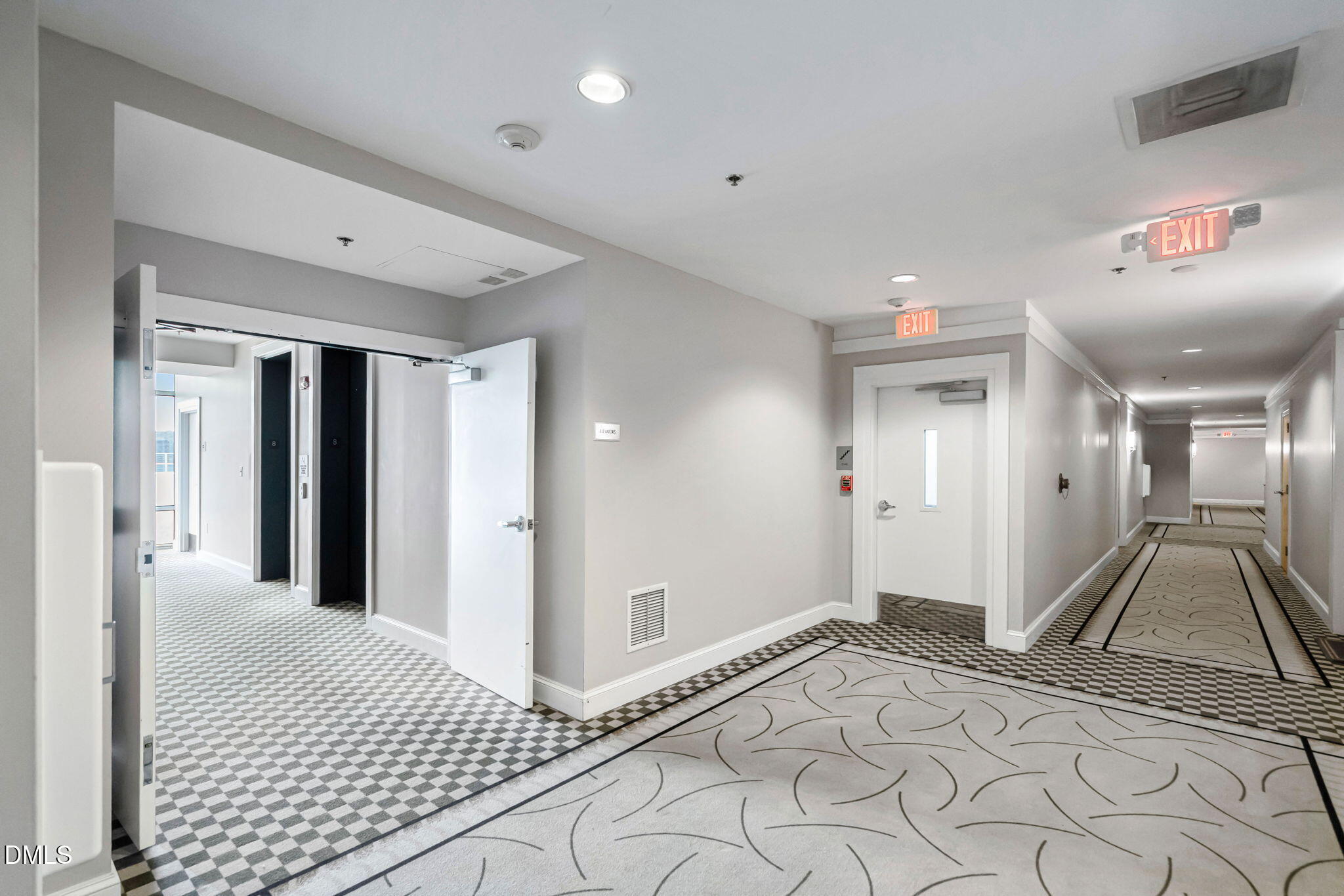 618 North Boylan Avenue, Unit 812 Raleigh, NC 27603 - Photo 32 of 35 a view of a hallway with a living room