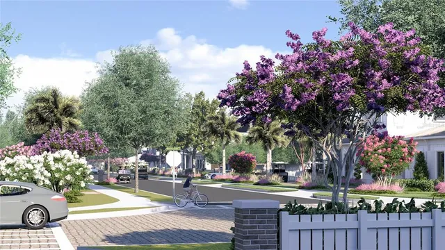 a view of a house with a yard and garden