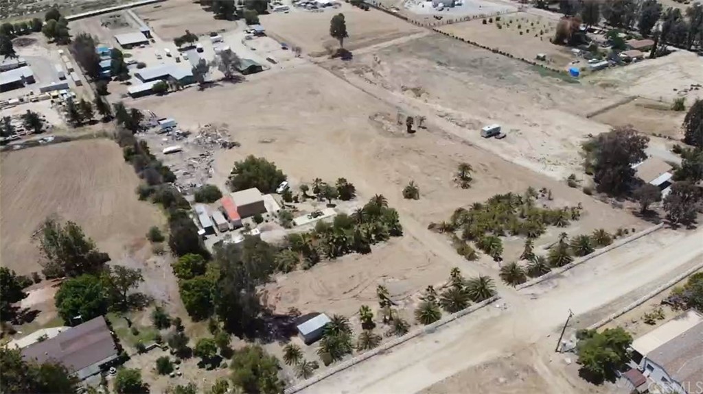 a view of a parking space covered with snow