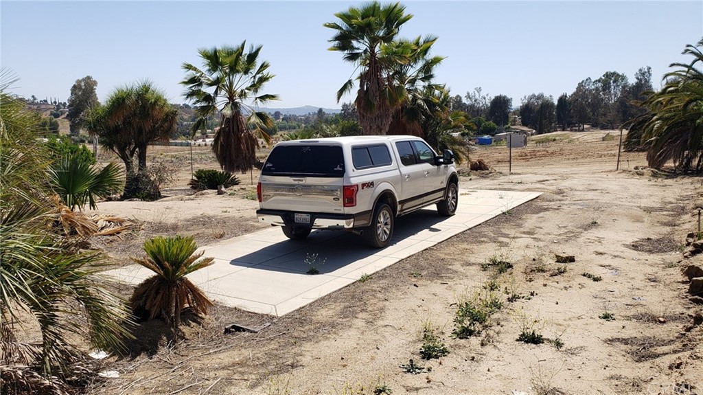 39300 Liefer Road Temecula, CA 92591 - Photo 11 of 28 a view of a backyard with a snow and trees