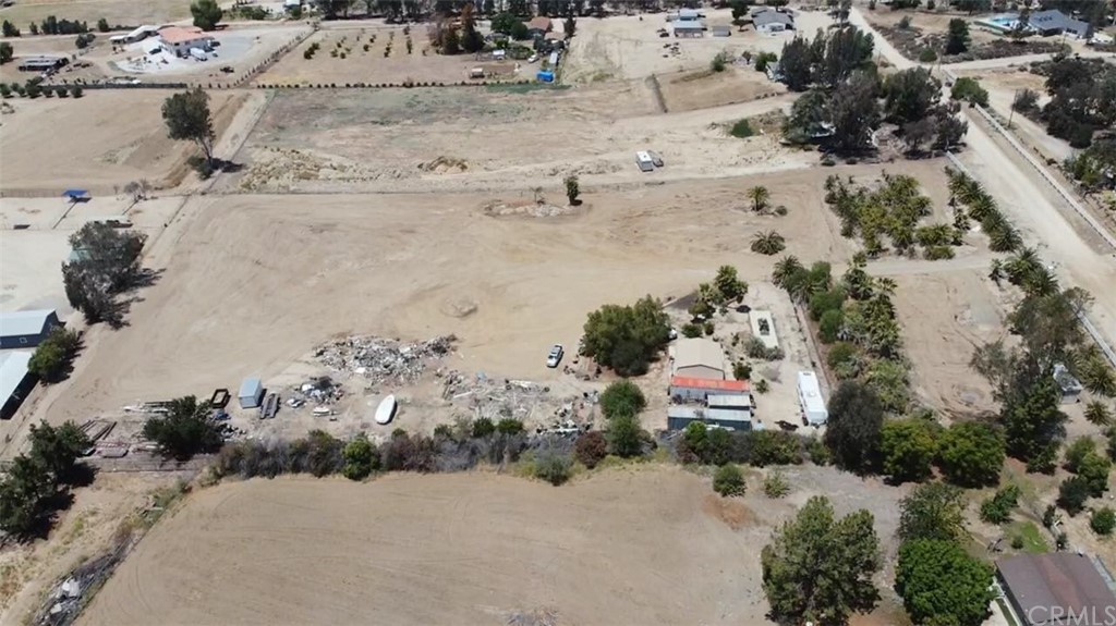 39300 Liefer Road Temecula, CA 92591 - Photo 5 of 28 an aerial view of a house with a yard covered with snow