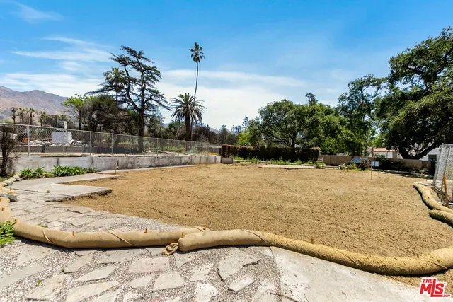 a view of outdoor space with swimming pool