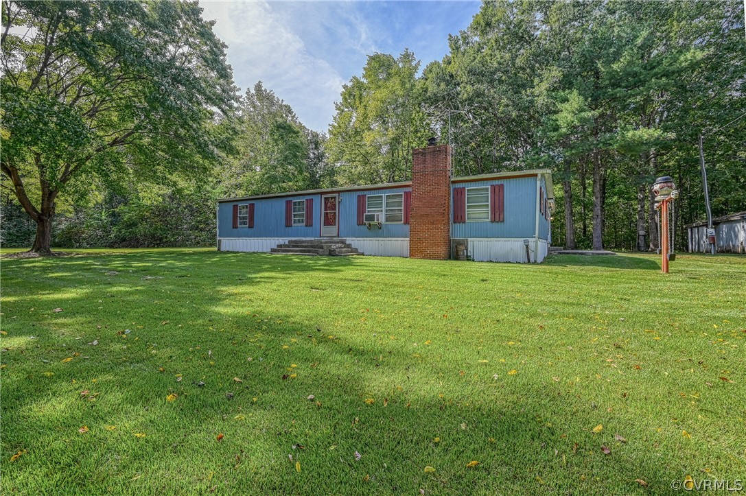 13287 Cross County Road Mineral, VA 23117 - Photo 3 of 27 a view of a house with a yard