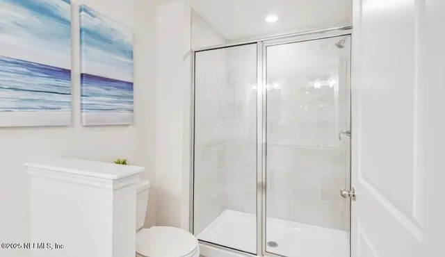 a bathroom with a sink vanity and a mirror