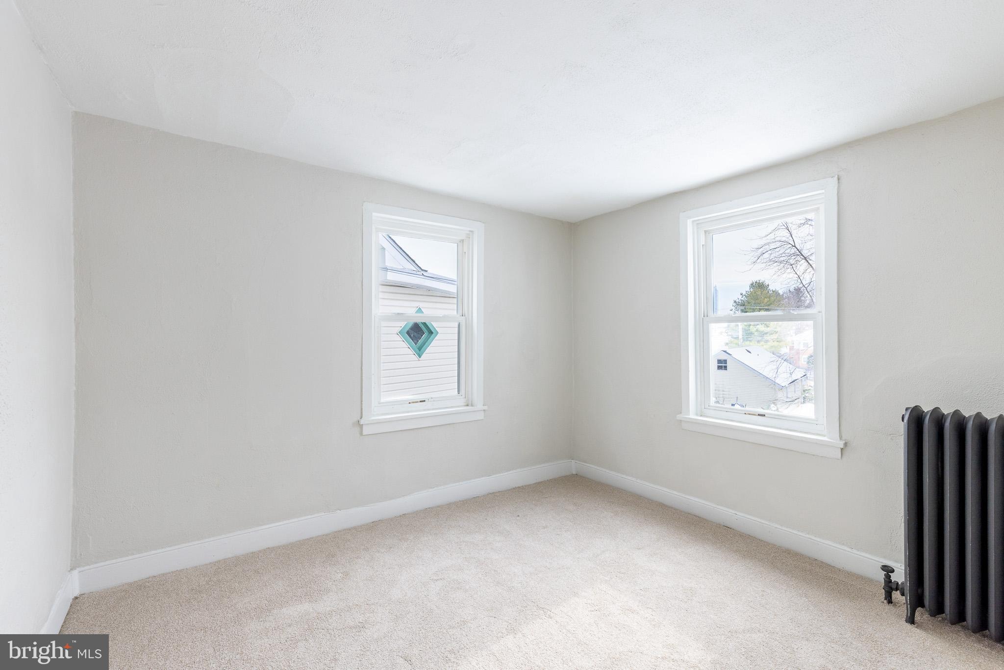 144 West King Street Littlestown, PA 17340 - Photo 14 of 20 an empty room with windows