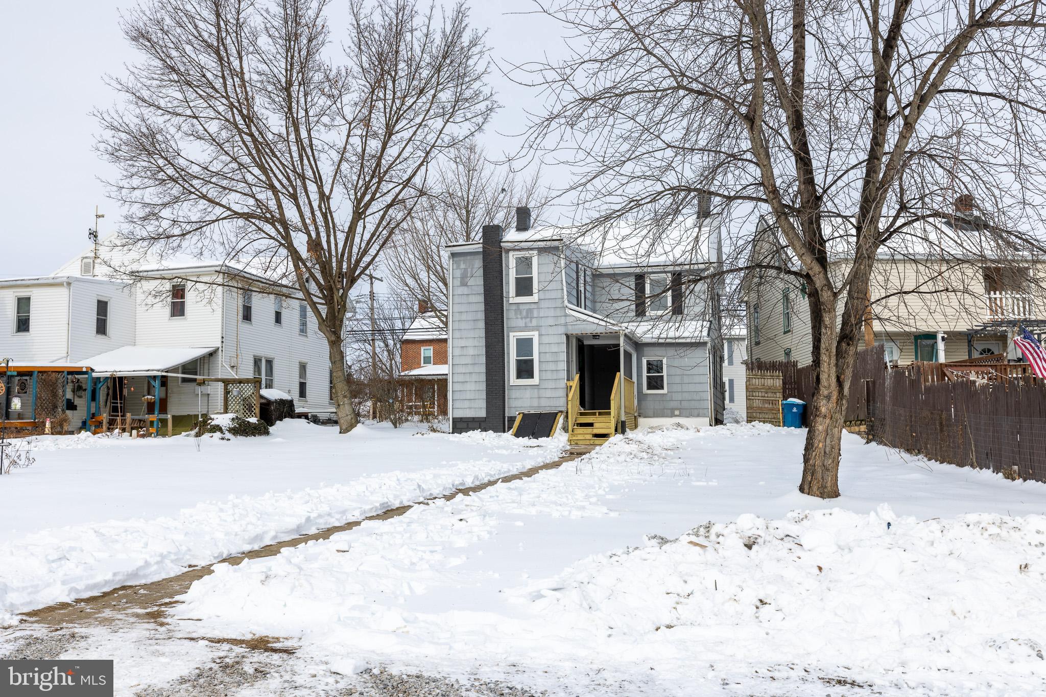 144 West King Street Littlestown, PA 17340 - Photo 20 of 20 a street view covered with snow on the road