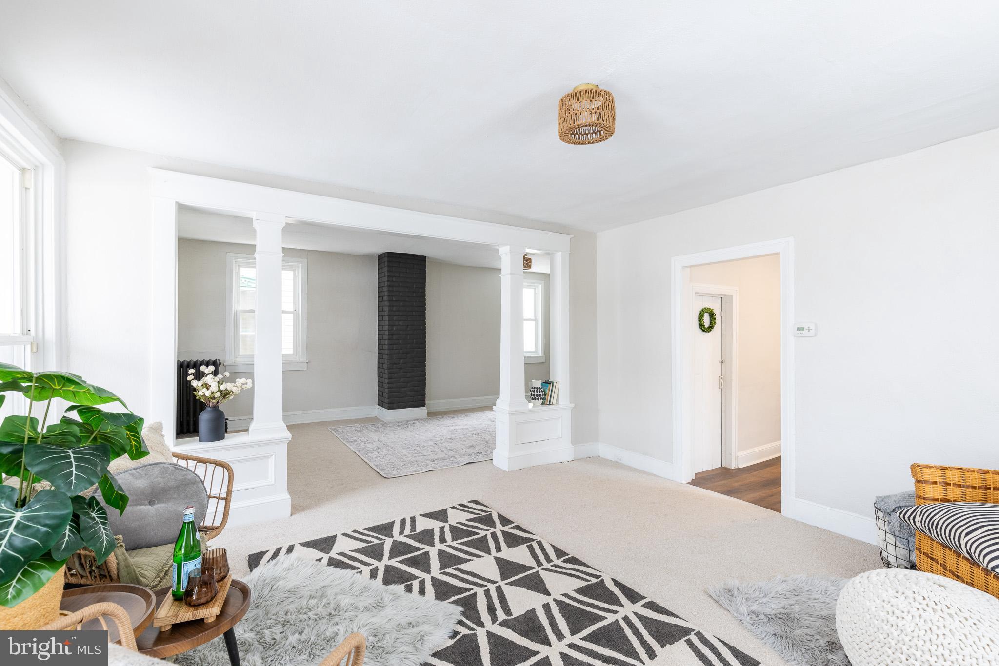 144 West King Street Littlestown, PA 17340 - Photo 5 of 20 a bedroom with furniture and a potted plant