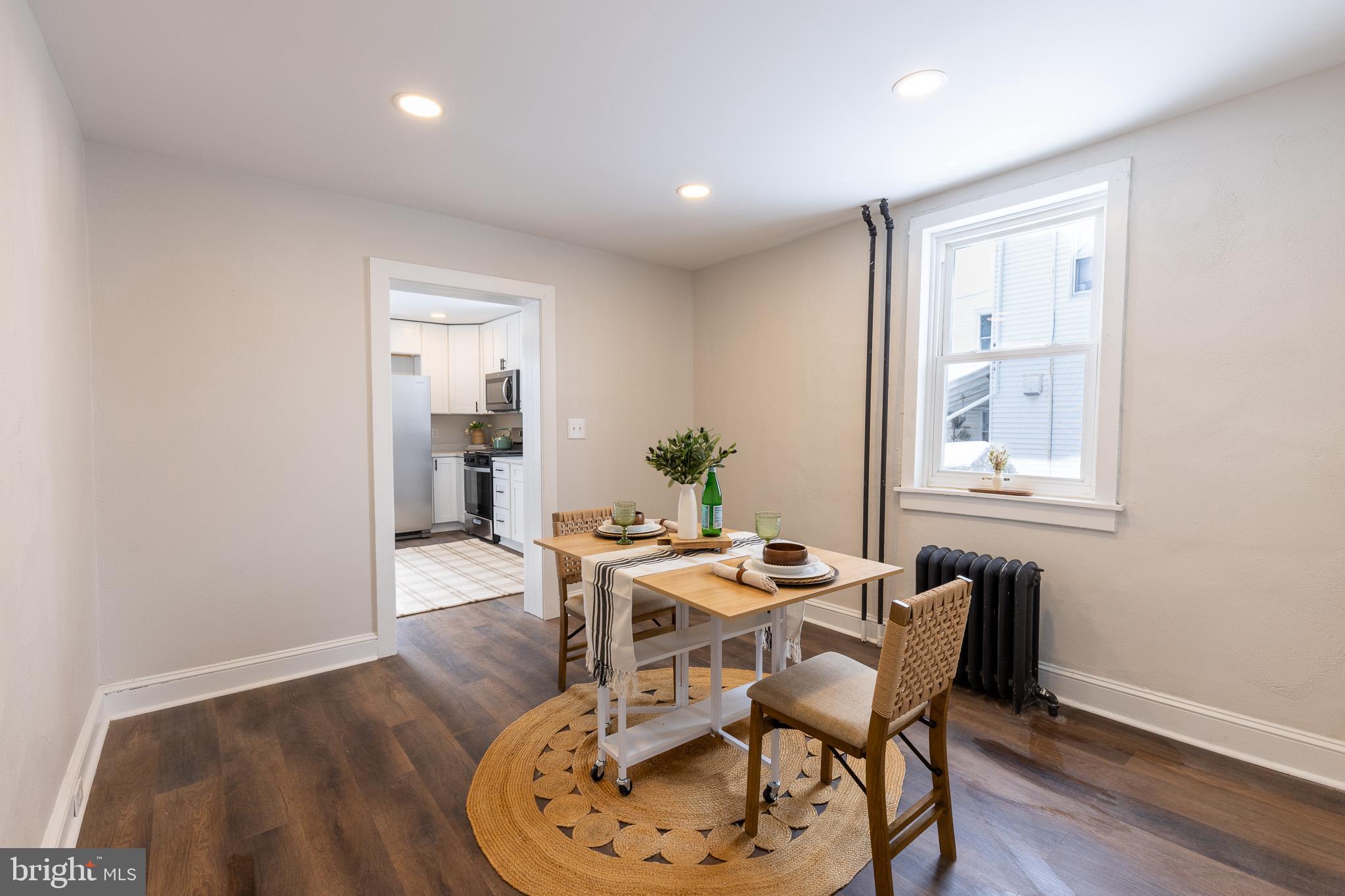 144 West King Street Littlestown, PA 17340 - Photo 6 of 20 a workspace with furniture and wooden floor