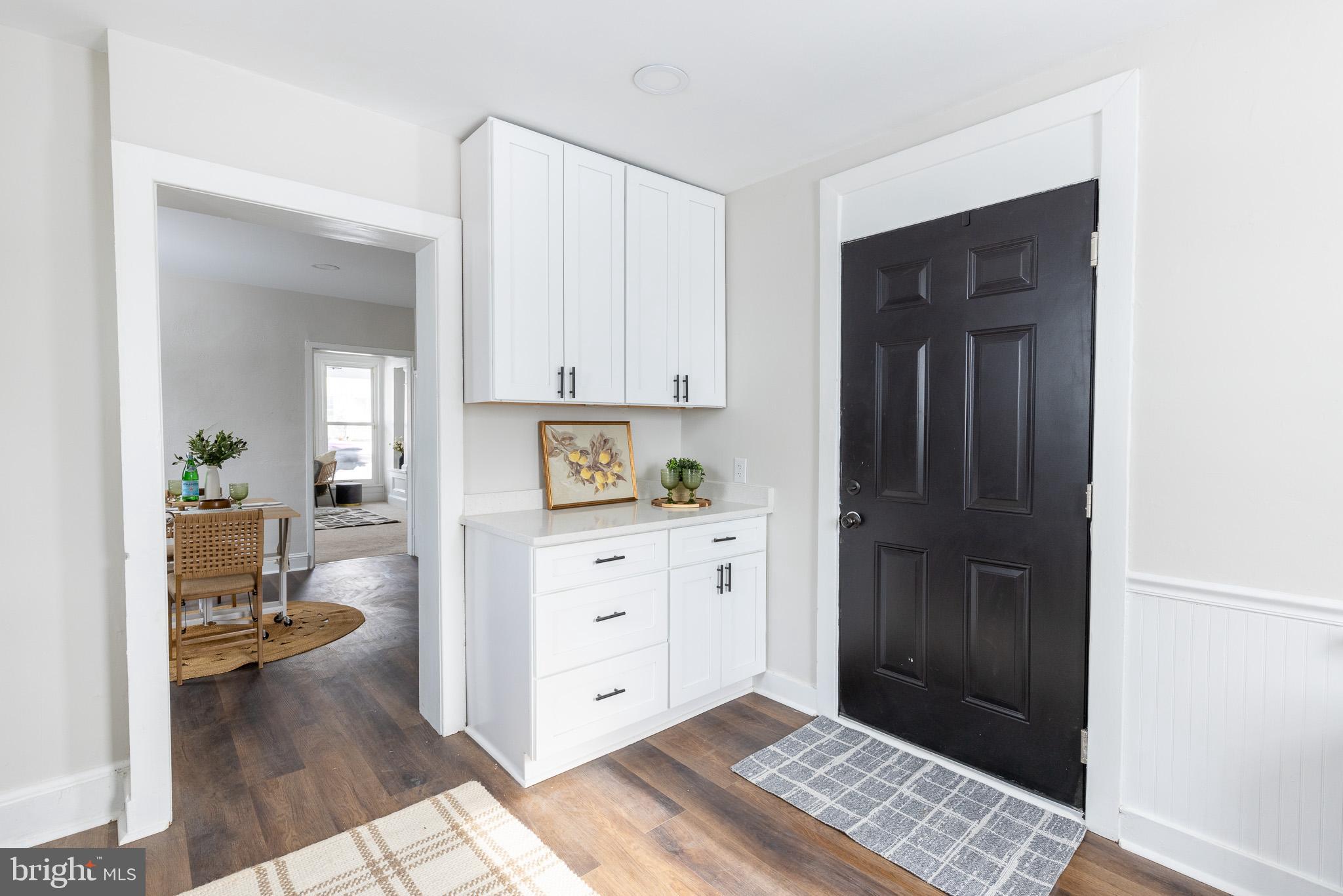 144 West King Street Littlestown, PA 17340 - Photo 9 of 20 a hallway with a dresser and a window