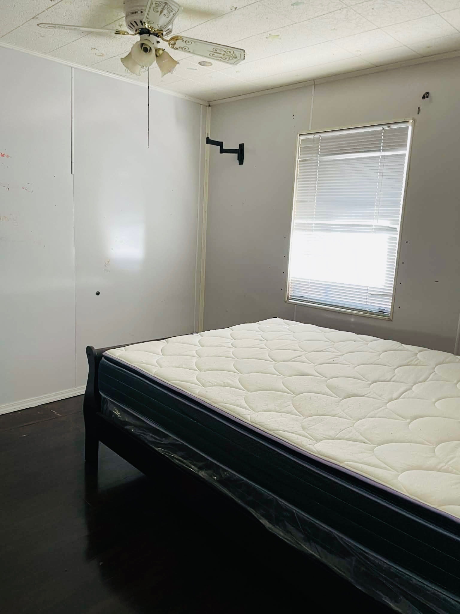 1825 Isom Street Houston, TX 77039 - Photo 22 of 27 a bedroom with a bed and a window
