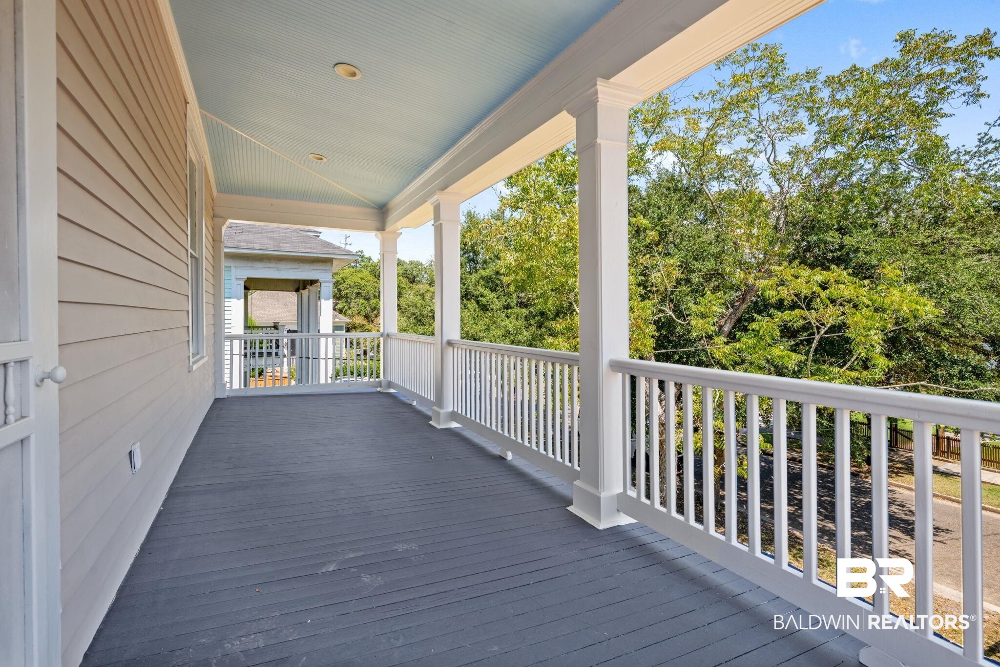 10 South Monterey Street Mobile, AL 36604 - Photo 34 of 45 Wooden terrace with view of wooded area