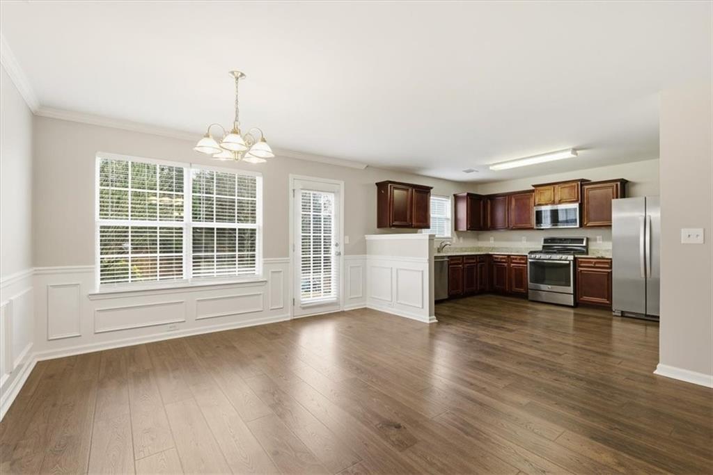342 Hidden Creek Lane Canton, GA 30114 - Photo 13 of 30 a view of kitchen with granite countertop stainless steel appliances and view living room