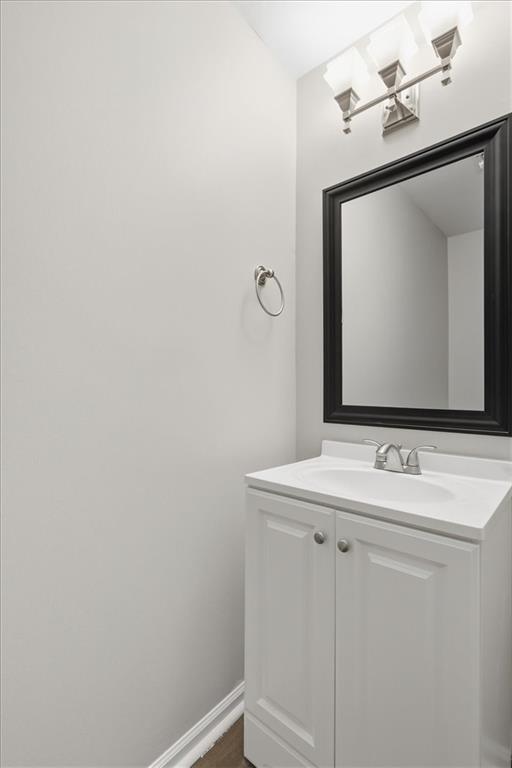 342 Hidden Creek Lane Canton, GA 30114 - Photo 19 of 30 a bathroom with a sink a mirror and vanity