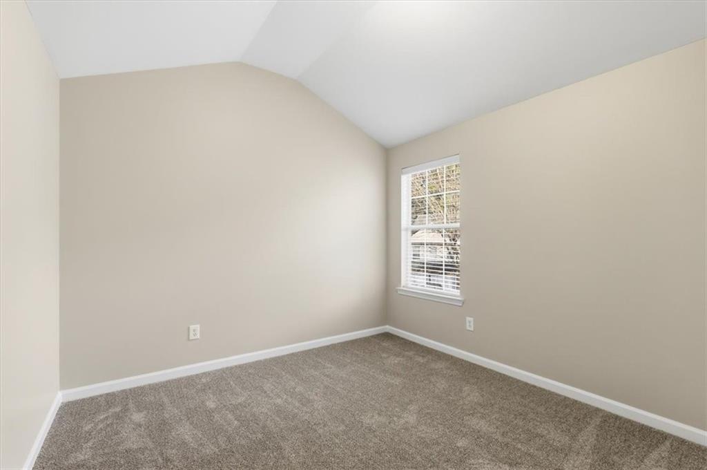 342 Hidden Creek Lane Canton, GA 30114 - Photo 26 of 30 an empty room with a window