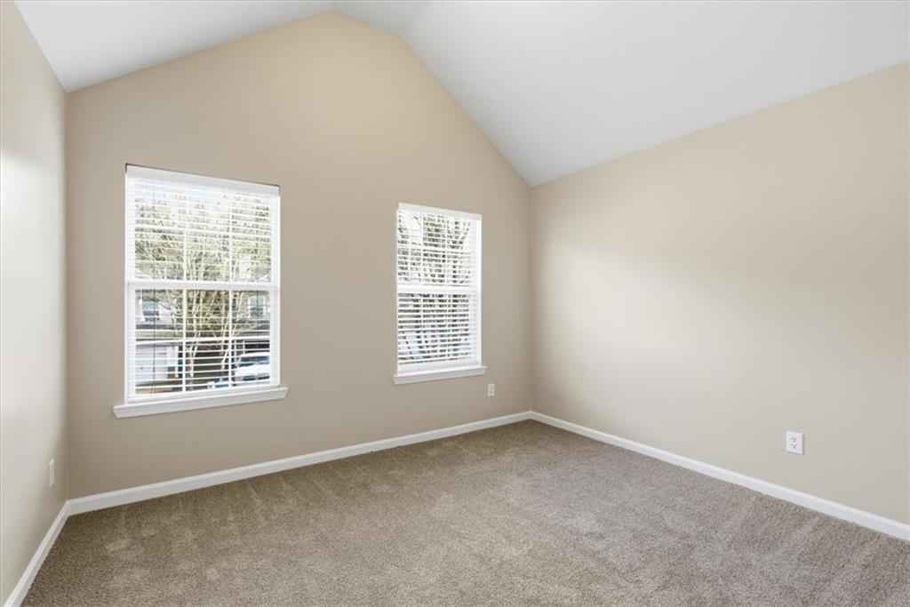 342 Hidden Creek Lane Canton, GA 30114 - Photo 27 of 30 a view of an empty room with a window