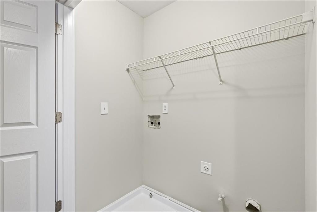 342 Hidden Creek Lane Canton, GA 30114 - Photo 29 of 30 a bathroom with a shower and a white door