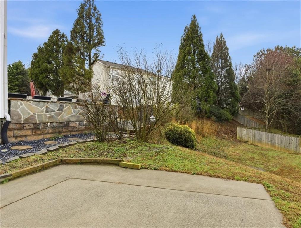 342 Hidden Creek Lane Canton, GA 30114 - Photo 5 of 30 a view of backyard with green space