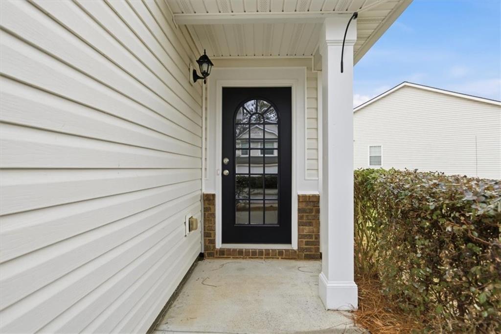 342 Hidden Creek Lane Canton, GA 30114 - Photo 7 of 30 a view of front door of house