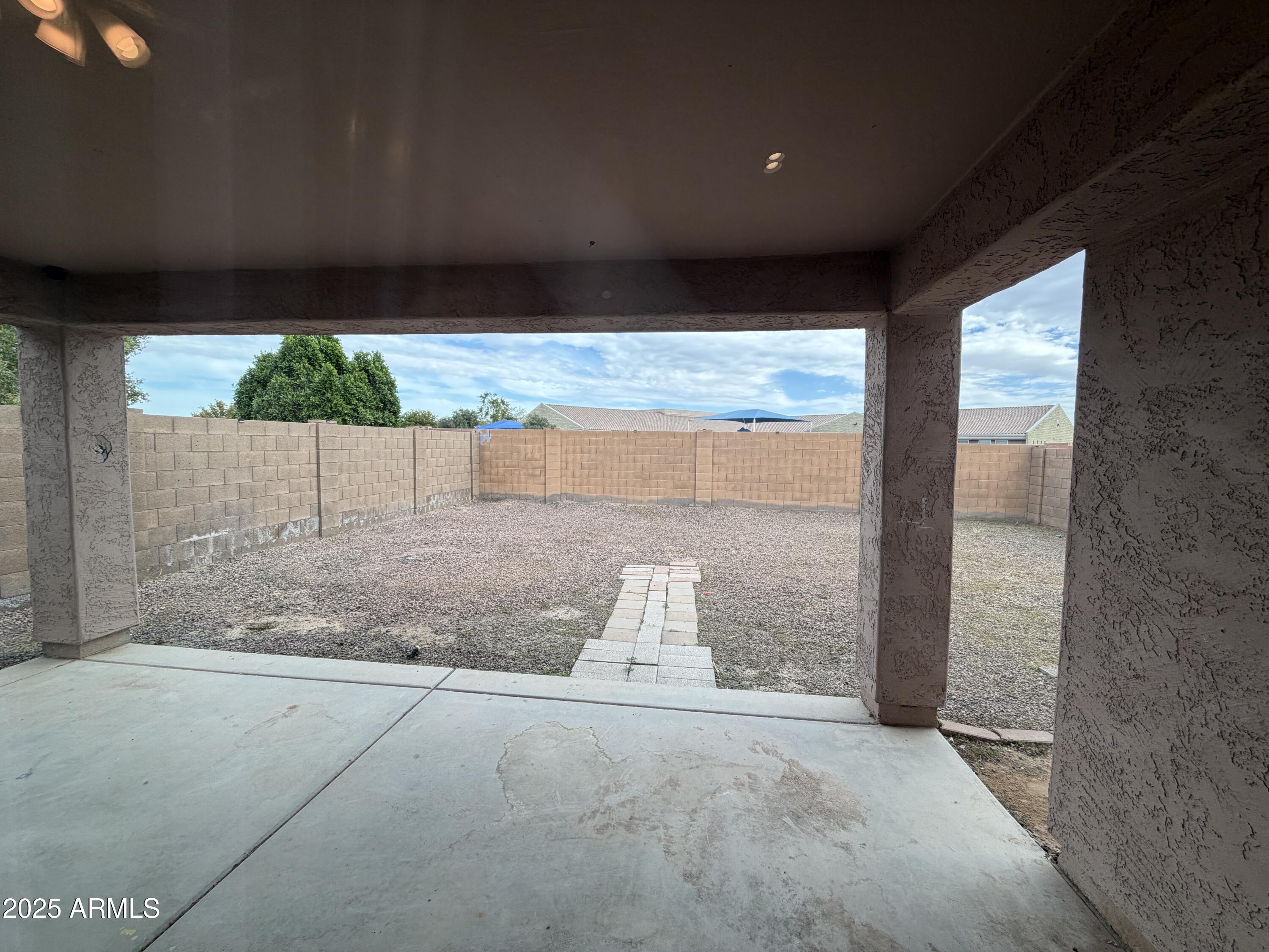 18123 North Madison Road Maricopa, AZ 85139 - Photo 11 of 26 a view of a porch