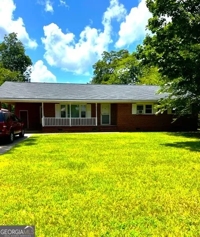 a view of a house with swimming pool