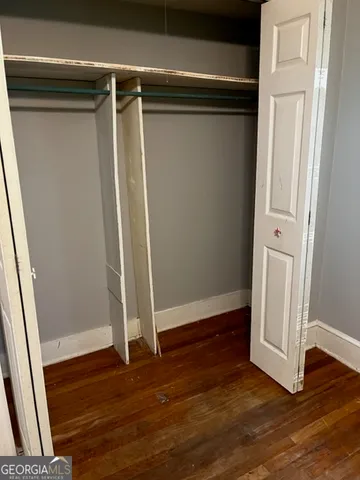 a view of a large garden with large trees