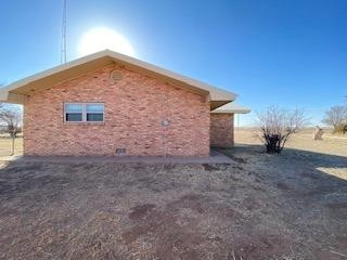 682 County Road 1038 Muleshoe, TX 79347 - Photo 15 of 23 a view of a house with a yard