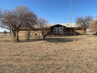 682 County Road 1038 Muleshoe, TX 79347 - Photo 17 of 23 a view of a house with a yard