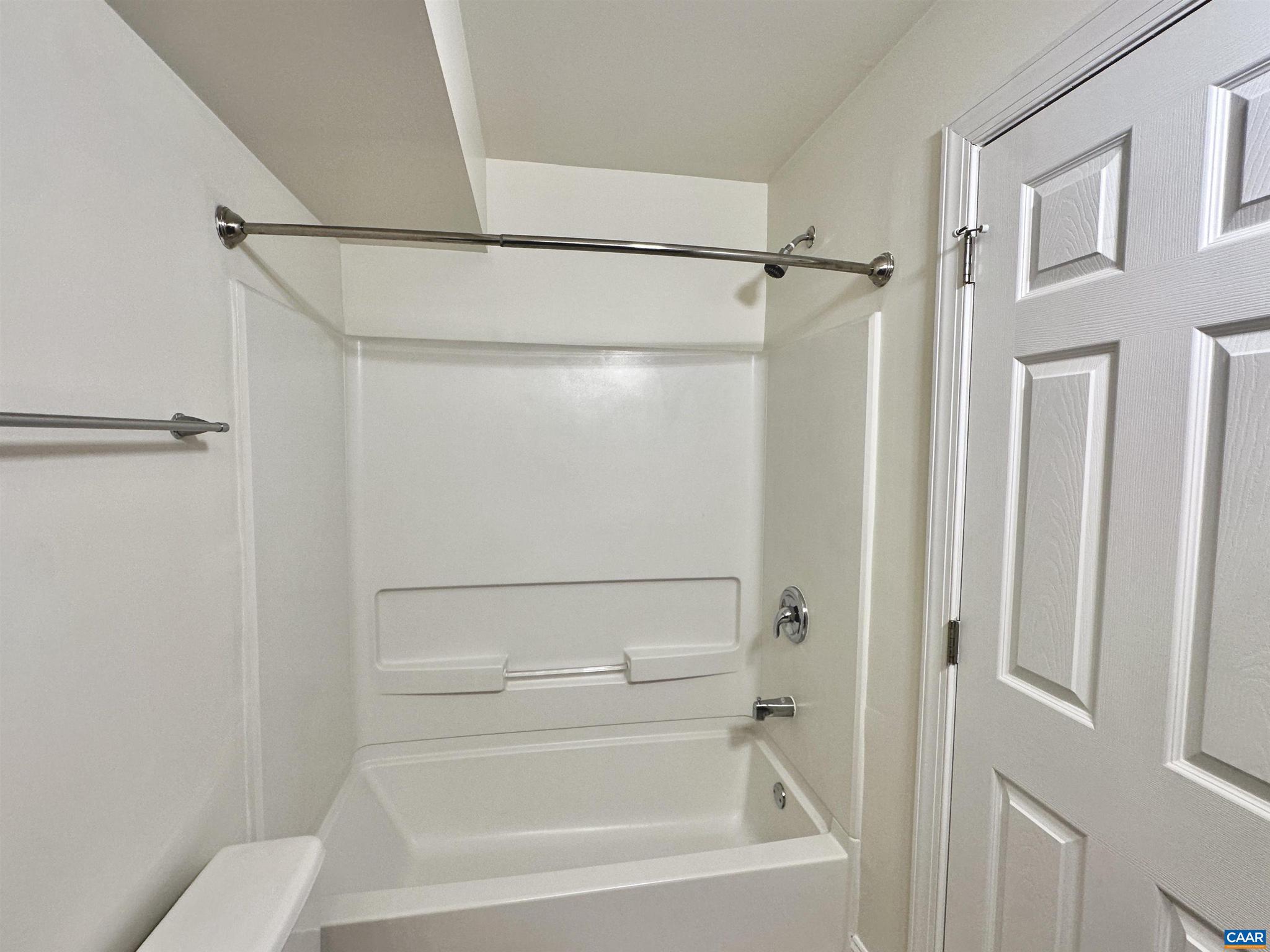 139 Green Turtle Lane, Unit 10 Charlottesville, VA 22901 - Photo 16 of 26 a bathroom with a shower and a bath tub